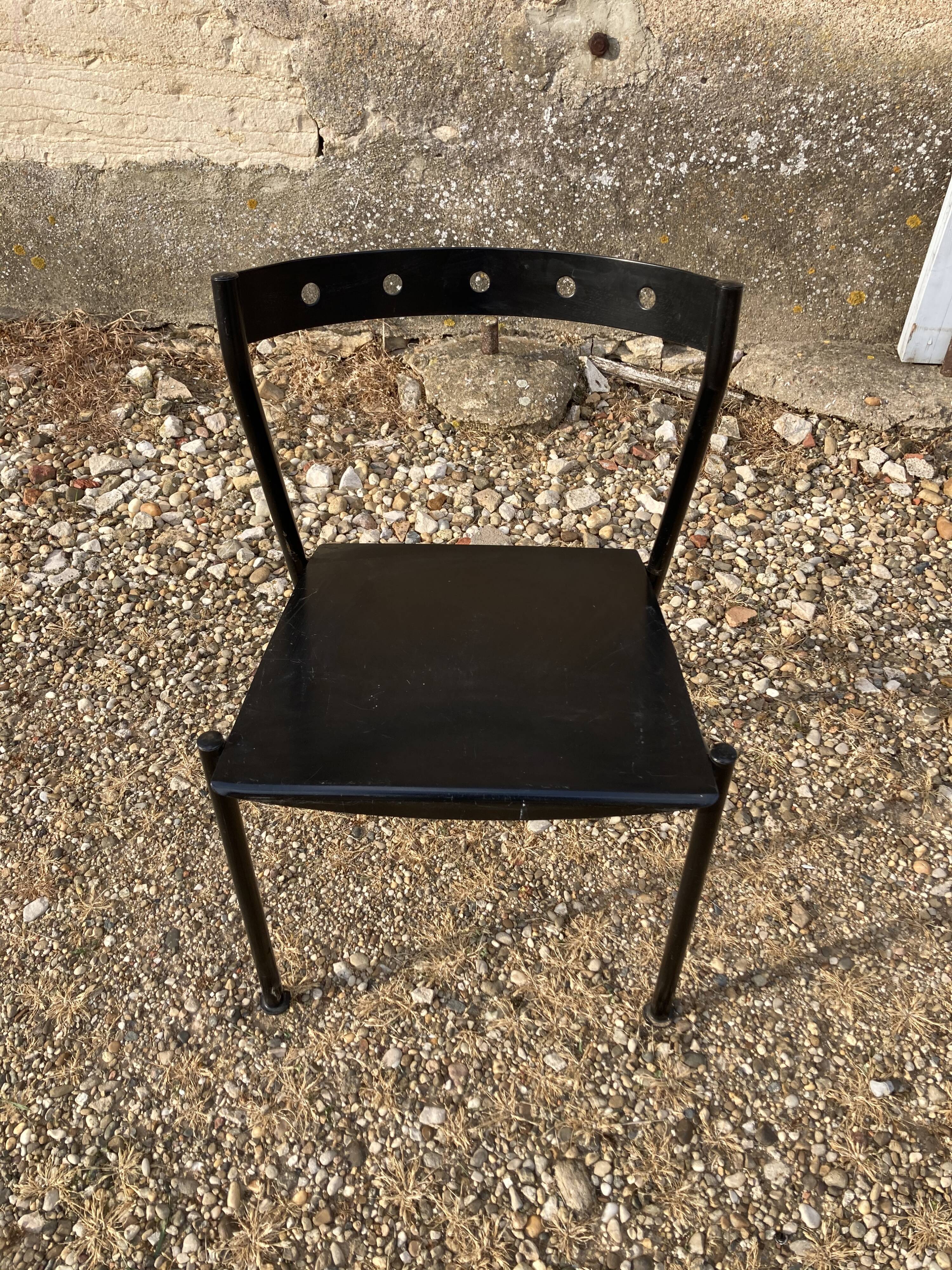 Series of 4 black iron chairs