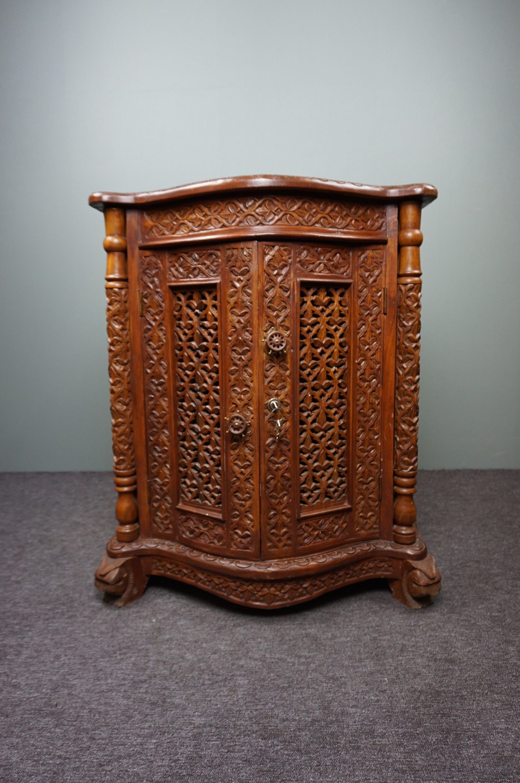 Carved wooden cabinet from the mid-20th century