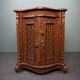 Carved wooden cabinet from the mid-20th century