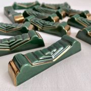 12 vintage green and gold ceramic knife holders from the 50s