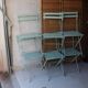 6 antique folding garden chairs made of painted wood and metal.