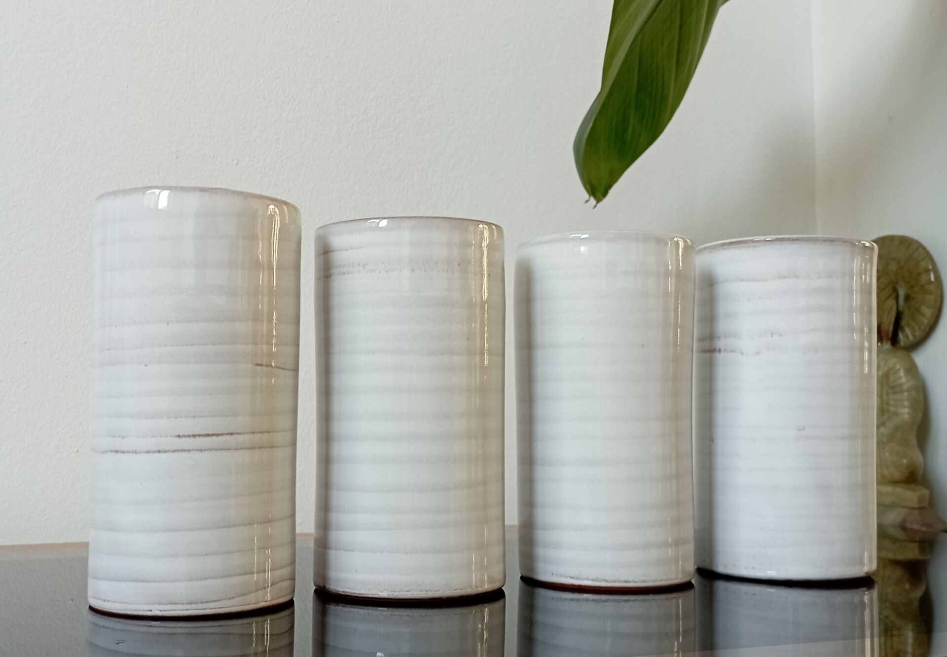 4 vintage stoneware cups in white