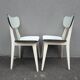 2 chairs in water green formica