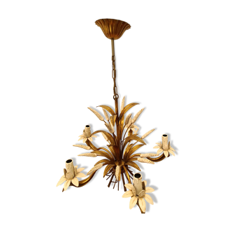 Gold metal chandelier with reed decoration