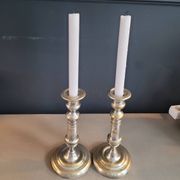 Pair of antique silver-plated brass candlesticks
