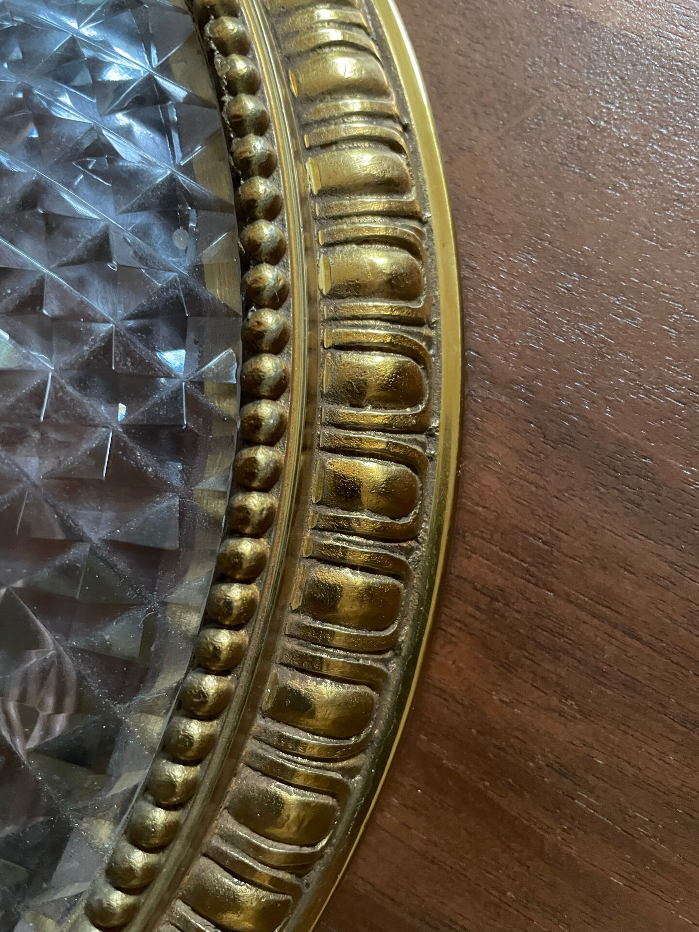 Antique ceiling light in bronze and cut crystal with diamond points.