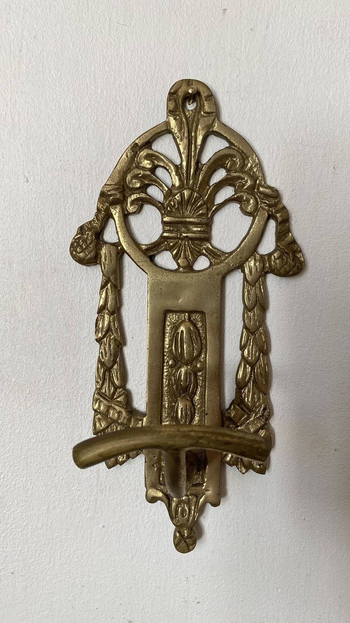 Brass coat hooks in the Napoleon III style.