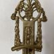 Brass coat hooks in the Napoleon III style.