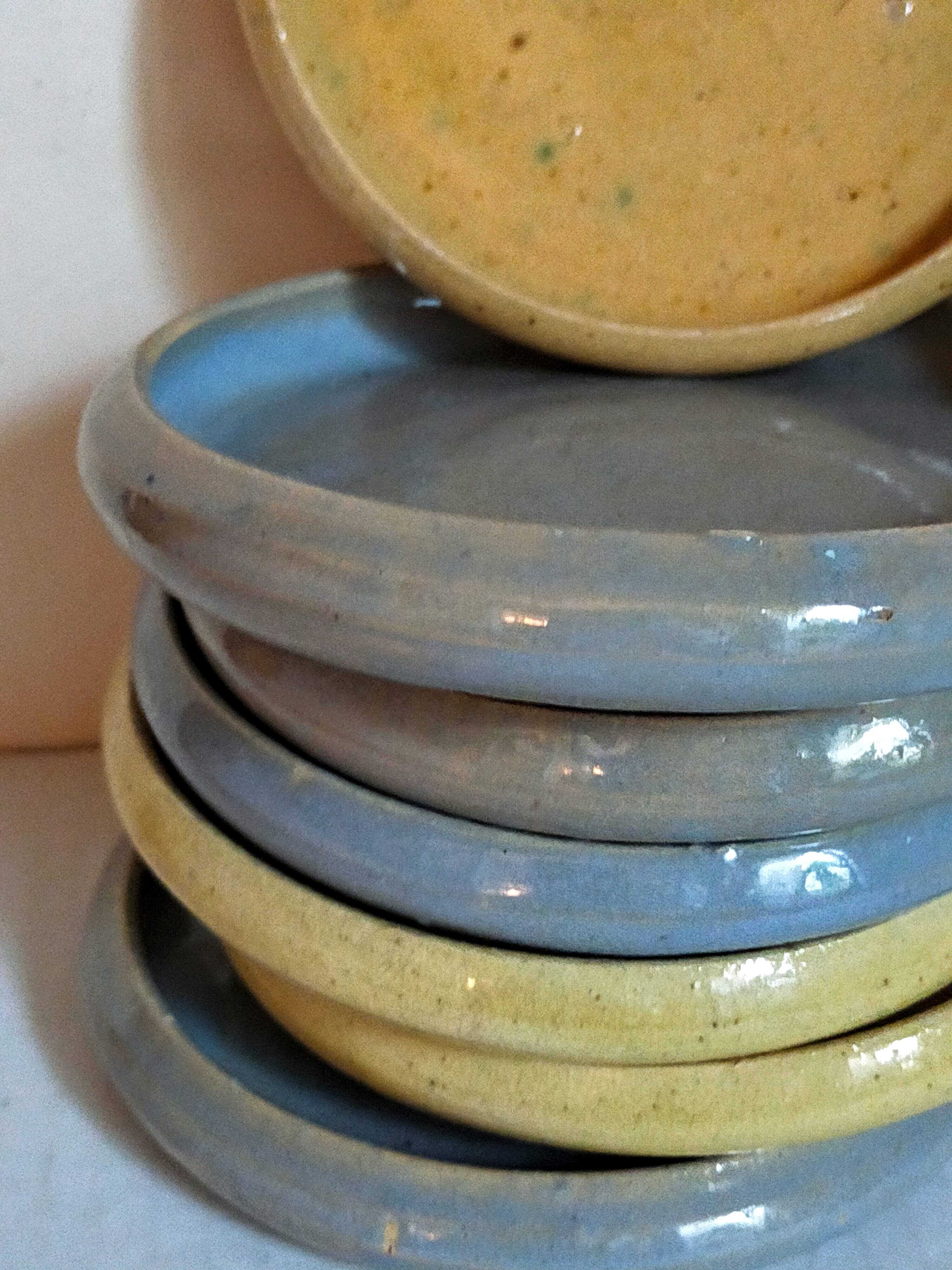 Seven vintage potter's sweet treat plates