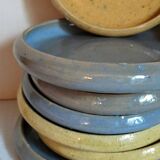 Seven vintage potter's sweet treat plates