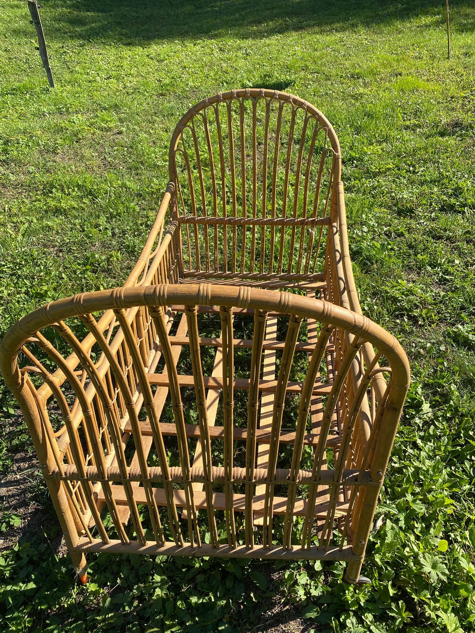 Children's bed in vintage rattan
