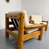 Set of 2 armchairs in solid pine with boucle fabric, 1970s Scandinavian design.