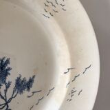 Two iron earth dishes