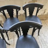Set of 7 black bistro chairs