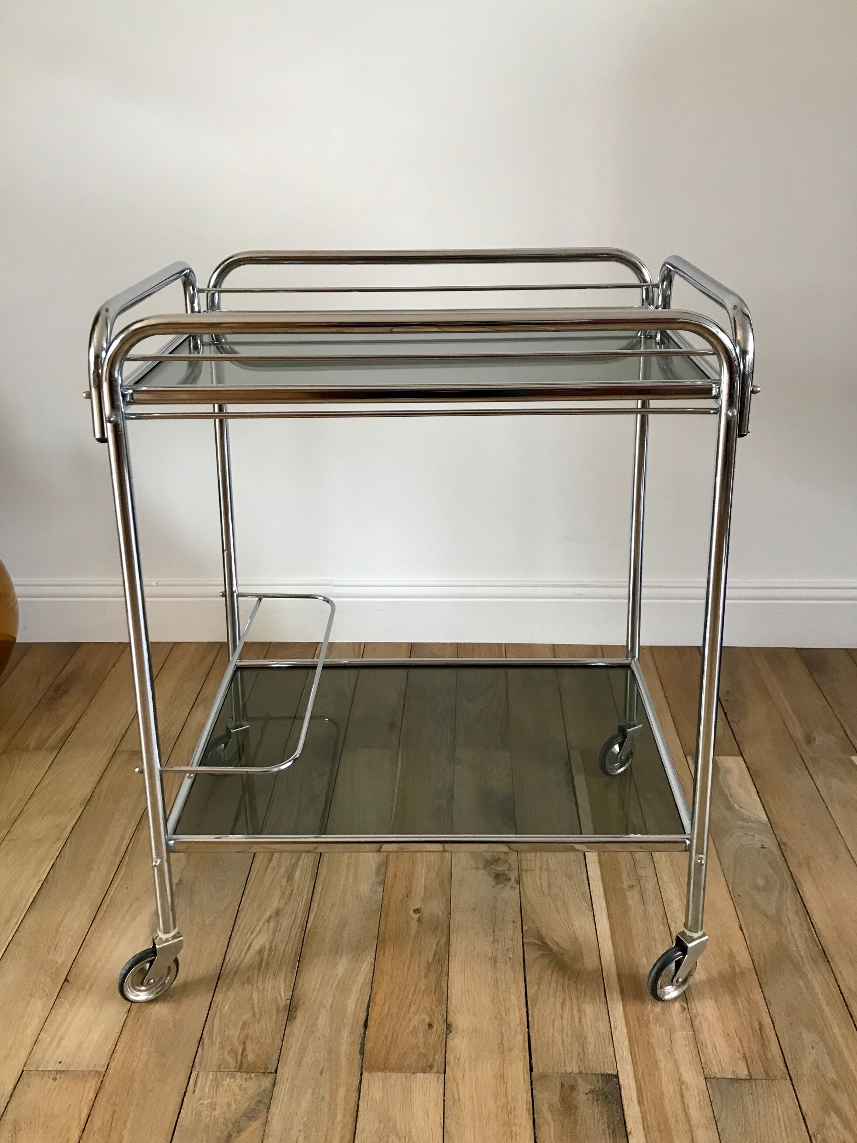 Serving in chrome steel and smoked glass 70s