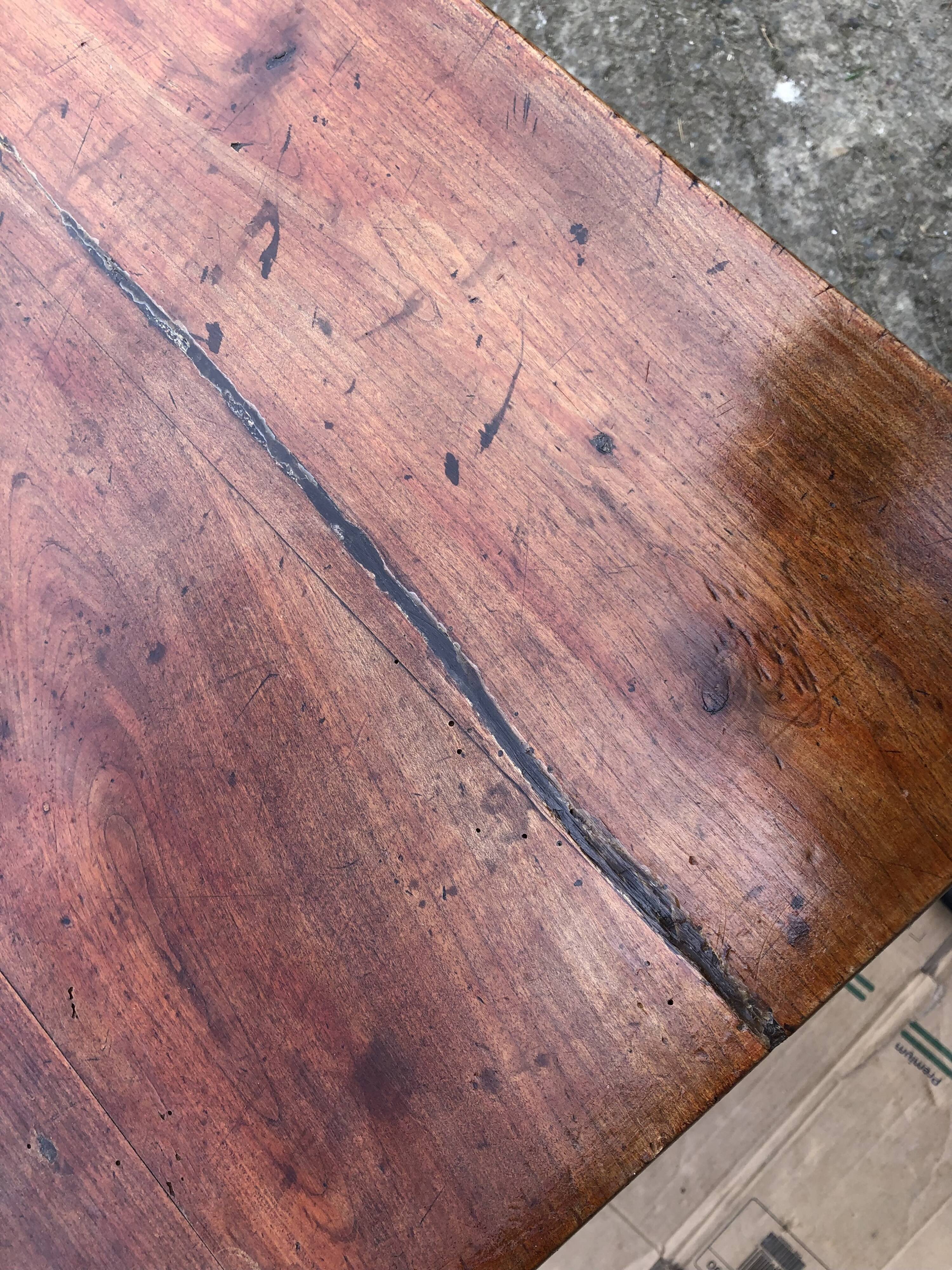 Old farmhouse table in solid cherry wood with 2 front drawers.