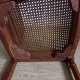 Chaise cannée art déco avec ornements en bronze.