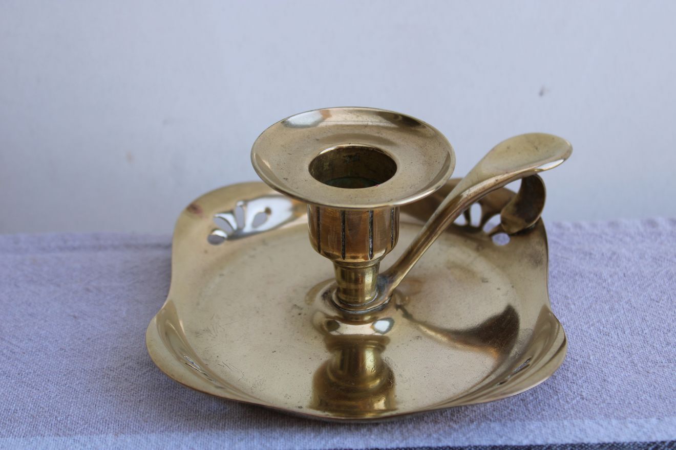 Golden brass candle holder