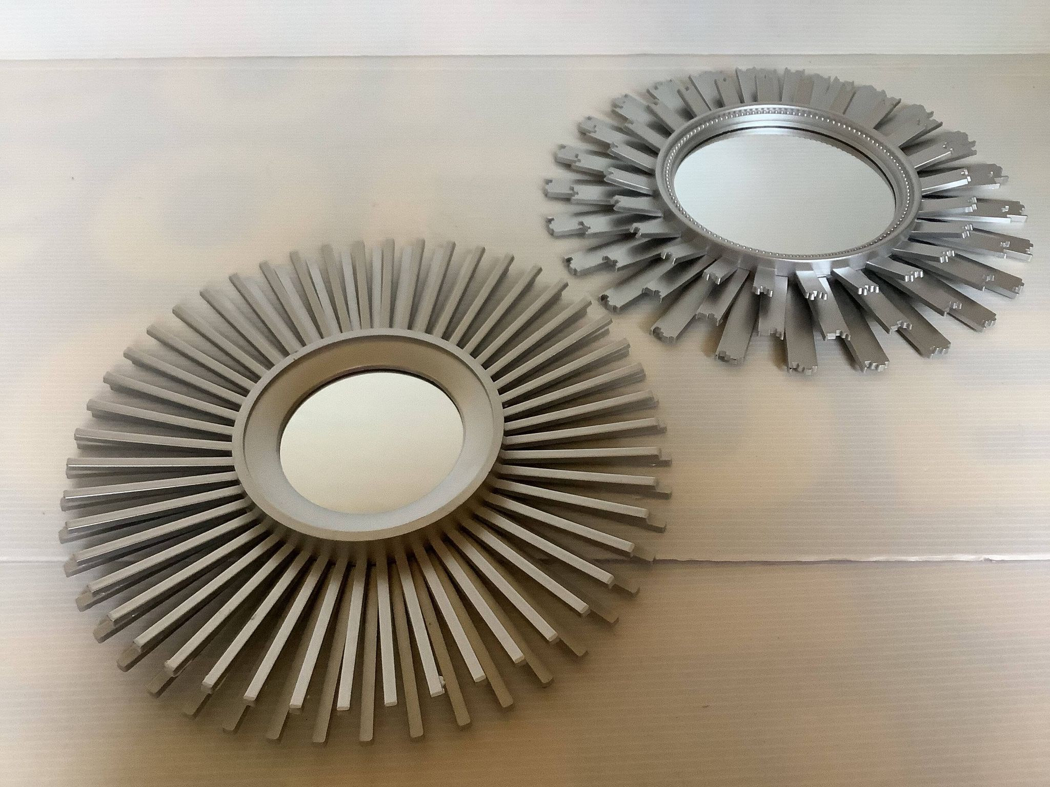 Pair of silver sun mirrors