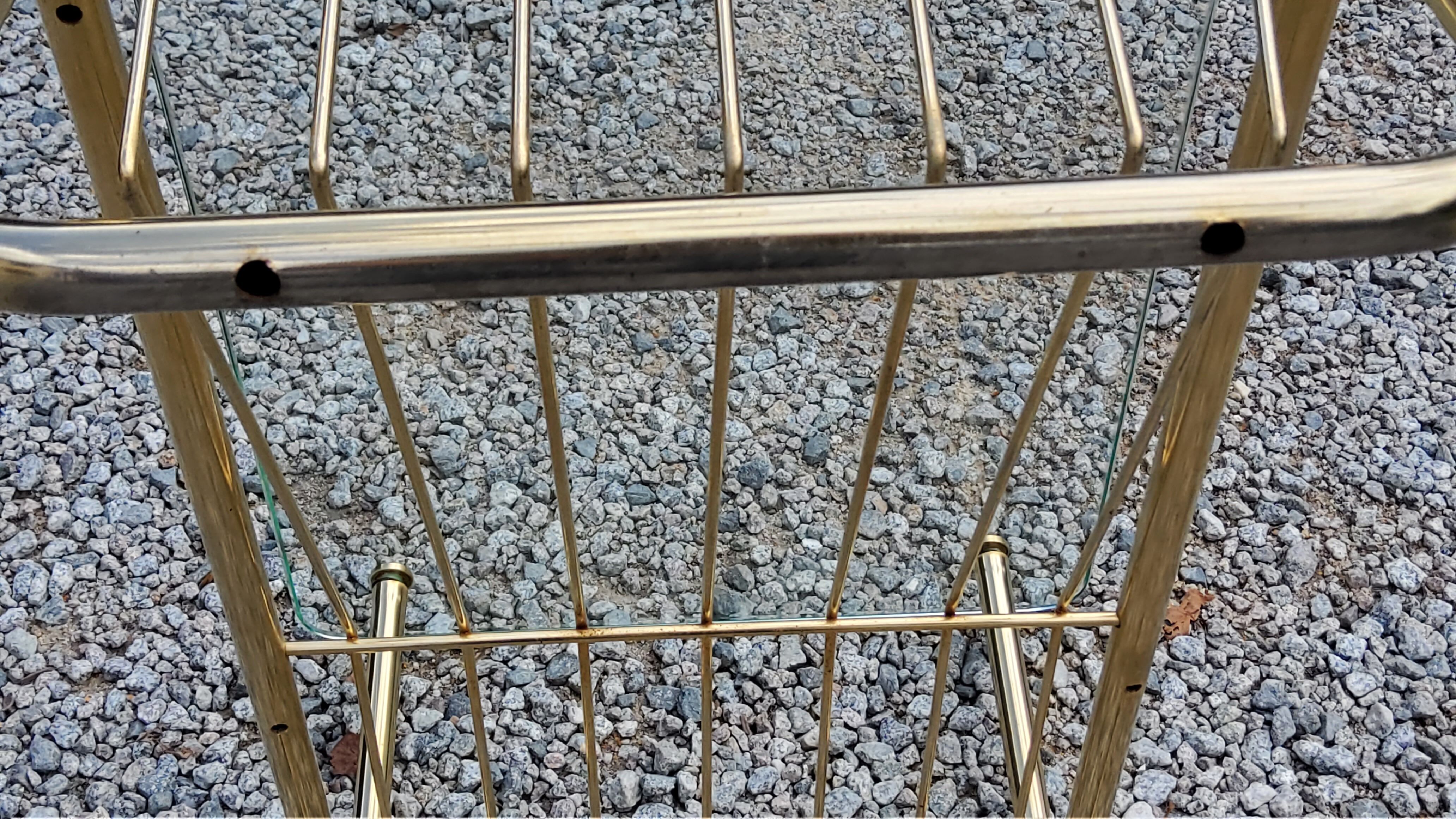 Coffee table from the 60s top glass base metal gilded