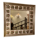 Large square ceramic mirror with floral decoration.