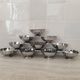10 stainless steel dessert / ice cream bowls in Guy Degrenne style, flower shape.