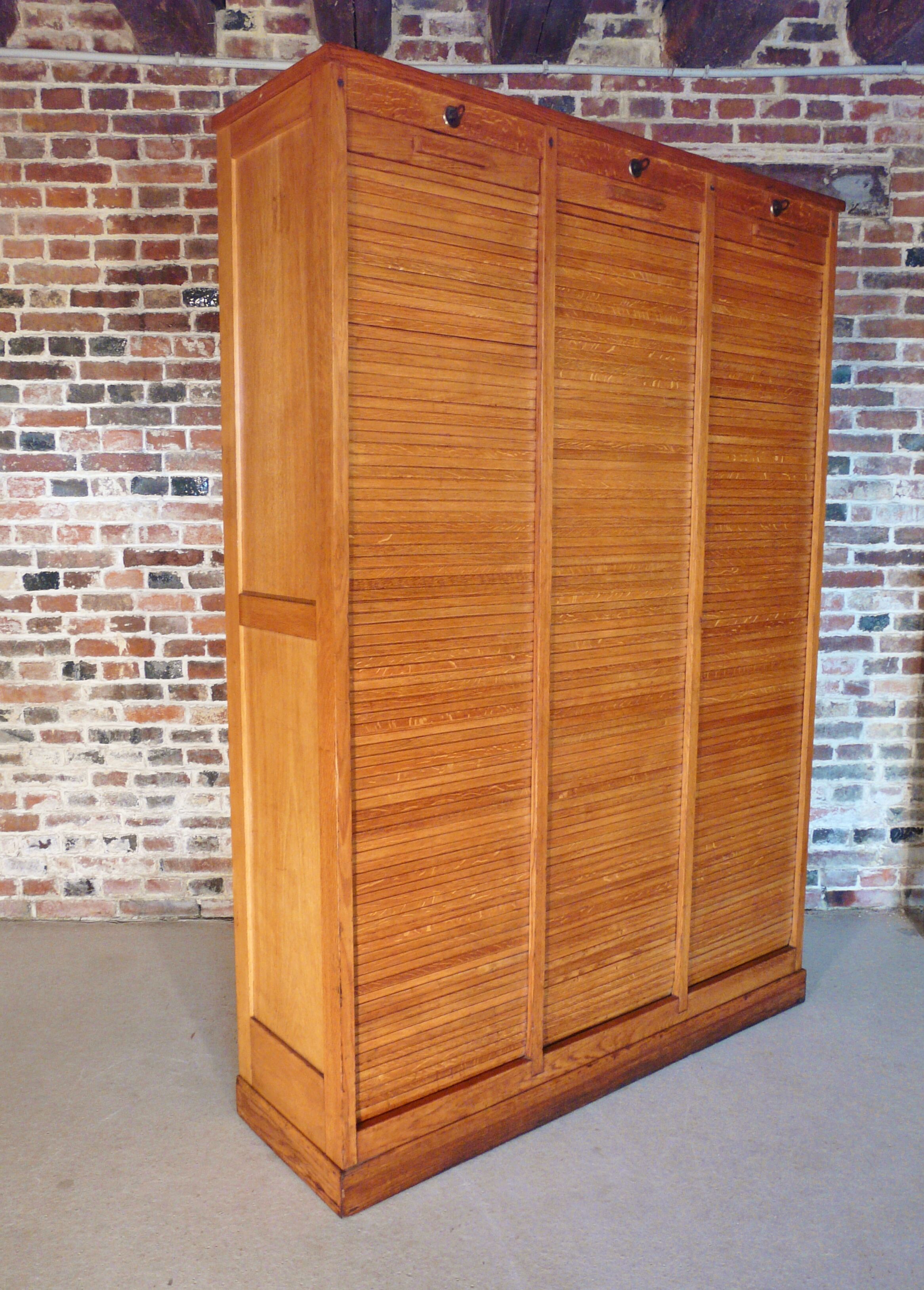 Furniture filing three curtains in oak 50s
