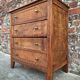 Art Deco commode with wooden top, vintage antique furniture.
