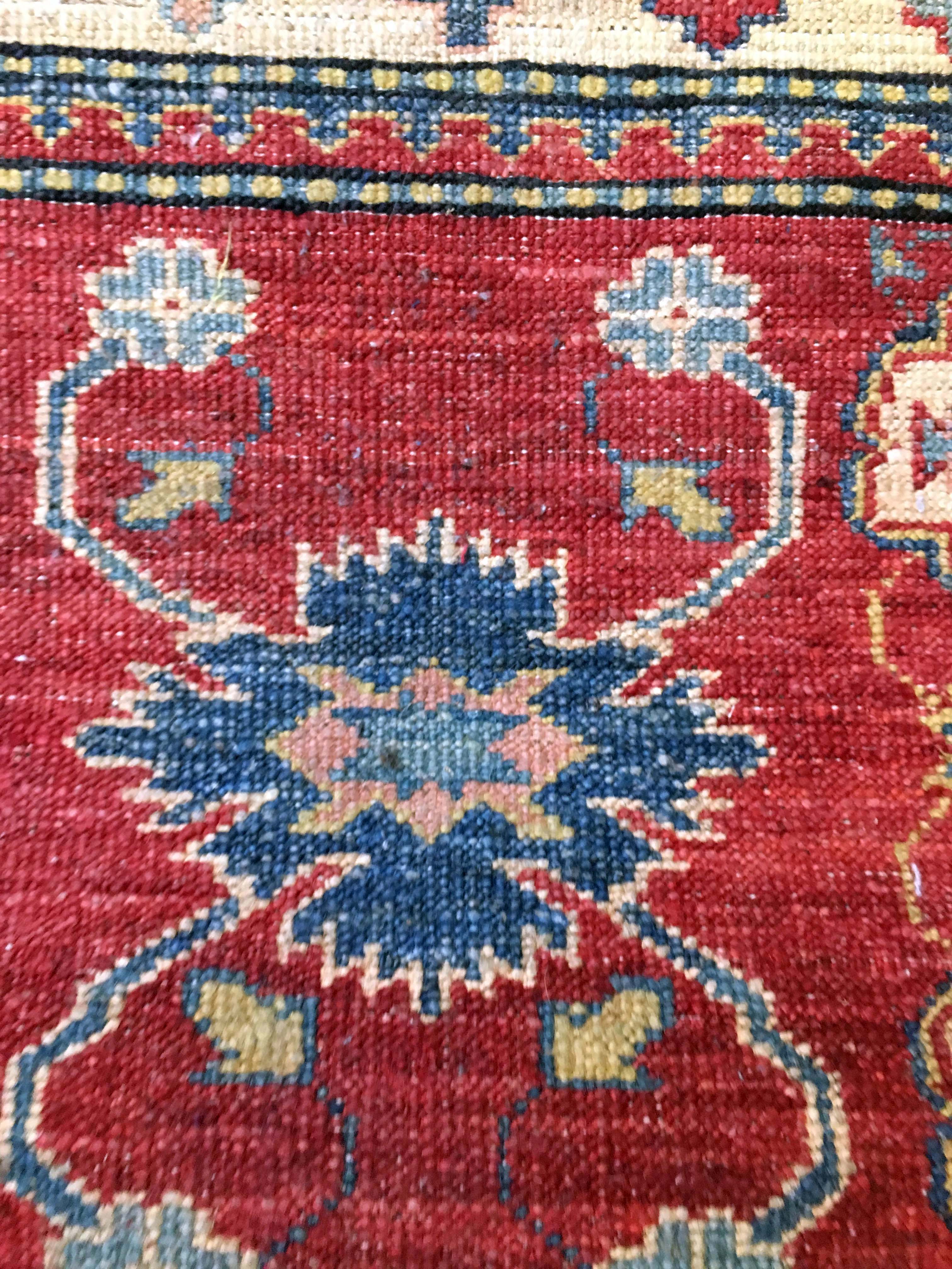 Remarkable oriental rug: former Kazak 310 x 84 cm