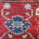 Remarkable oriental rug: former Kazak 310 x 84 cm