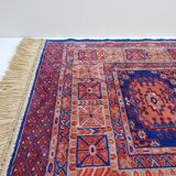 Tapis d’Orient bleu rouge avec franges