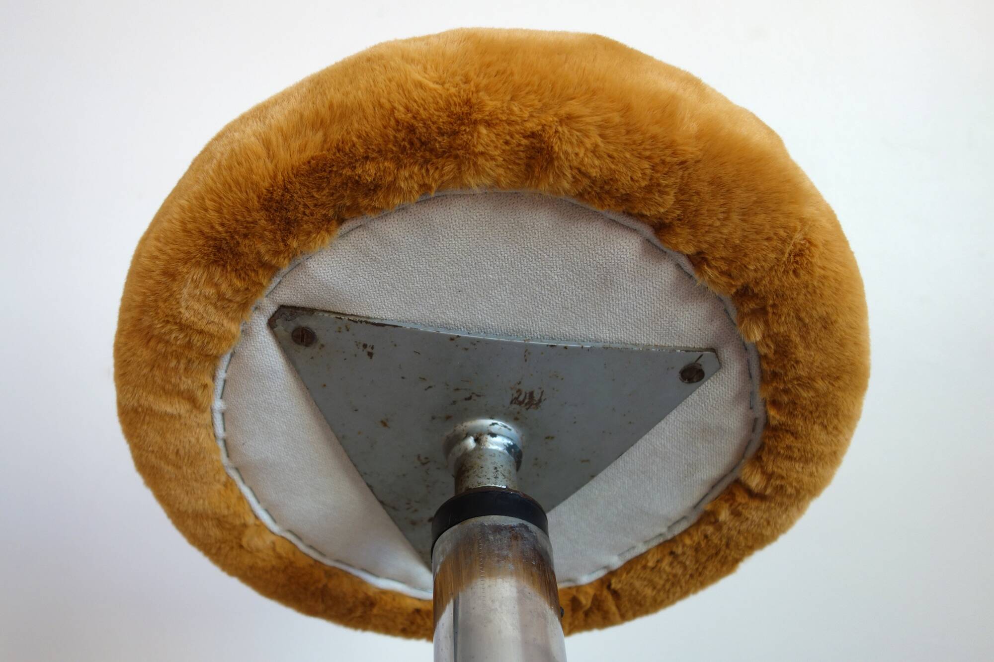 Vintage high stool in cast aluminum and sheepskin
