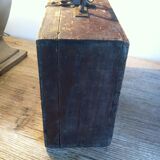 Suitcase in vintage box