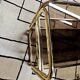 Brass coffee table with sliding top and smoked glass, 1970s vintage