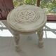Low tripod tabouret