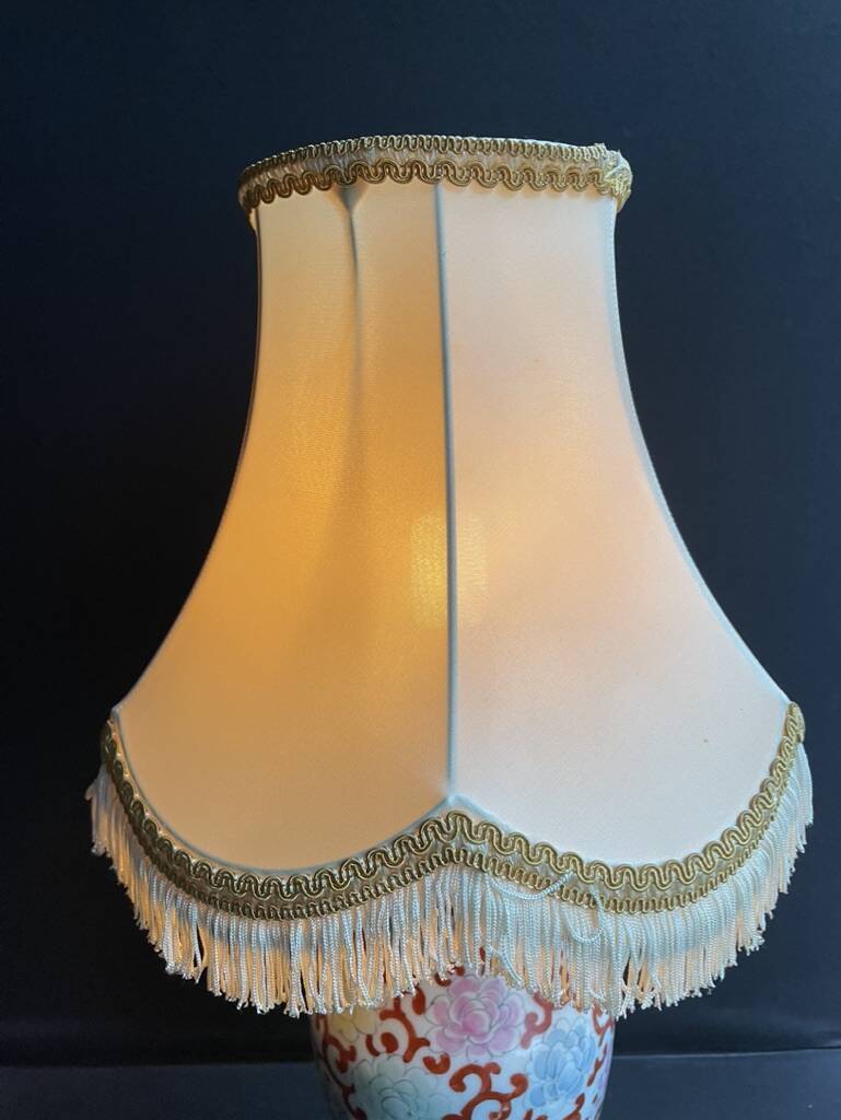 Old Asian vase mounted as a lamp with pagoda lampshade