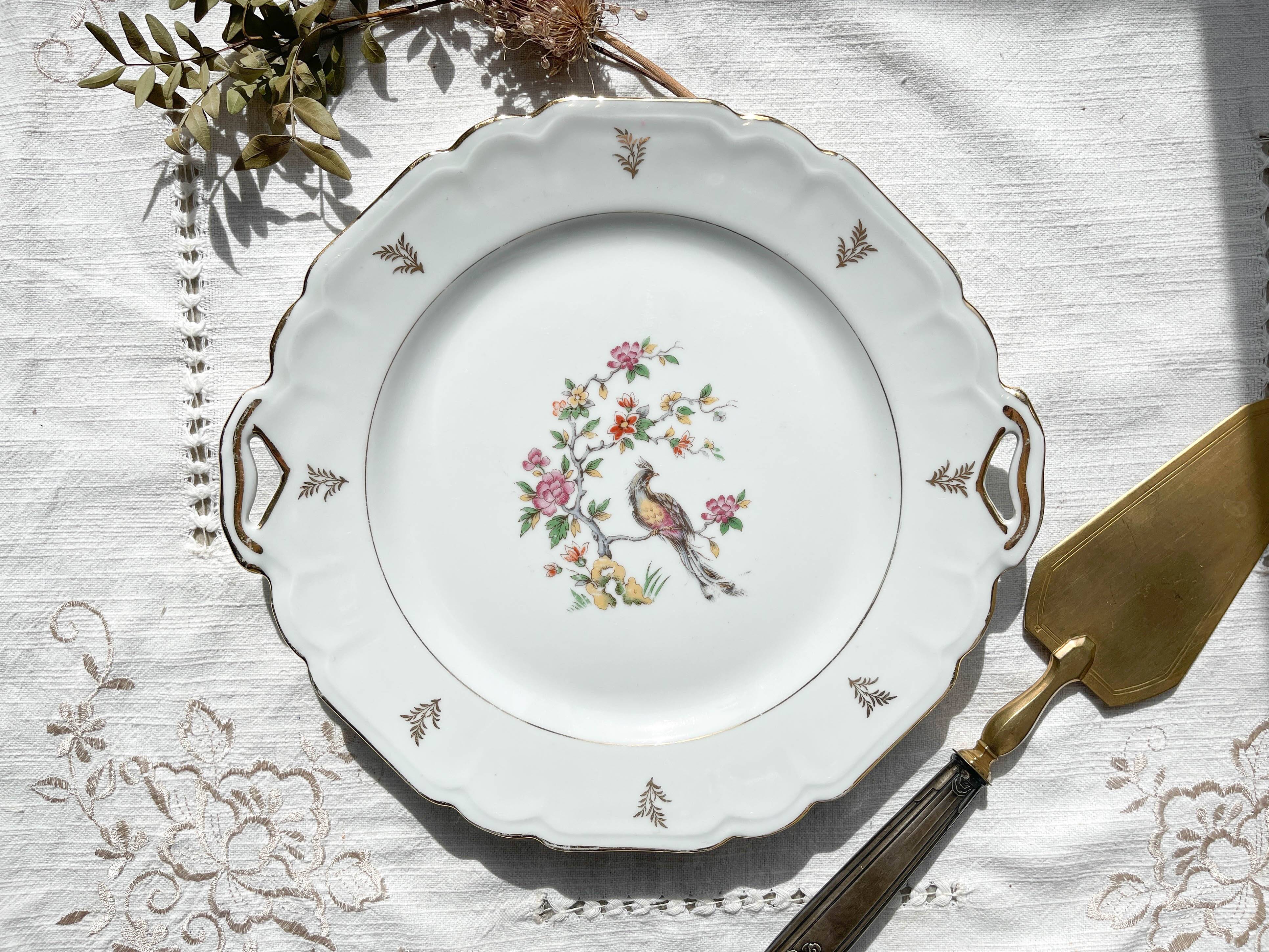 Vintage Limoges Berry porcelain cake dish with bird of paradise motif -
