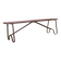 Old bench in Burmese teak with a wrought iron base.
