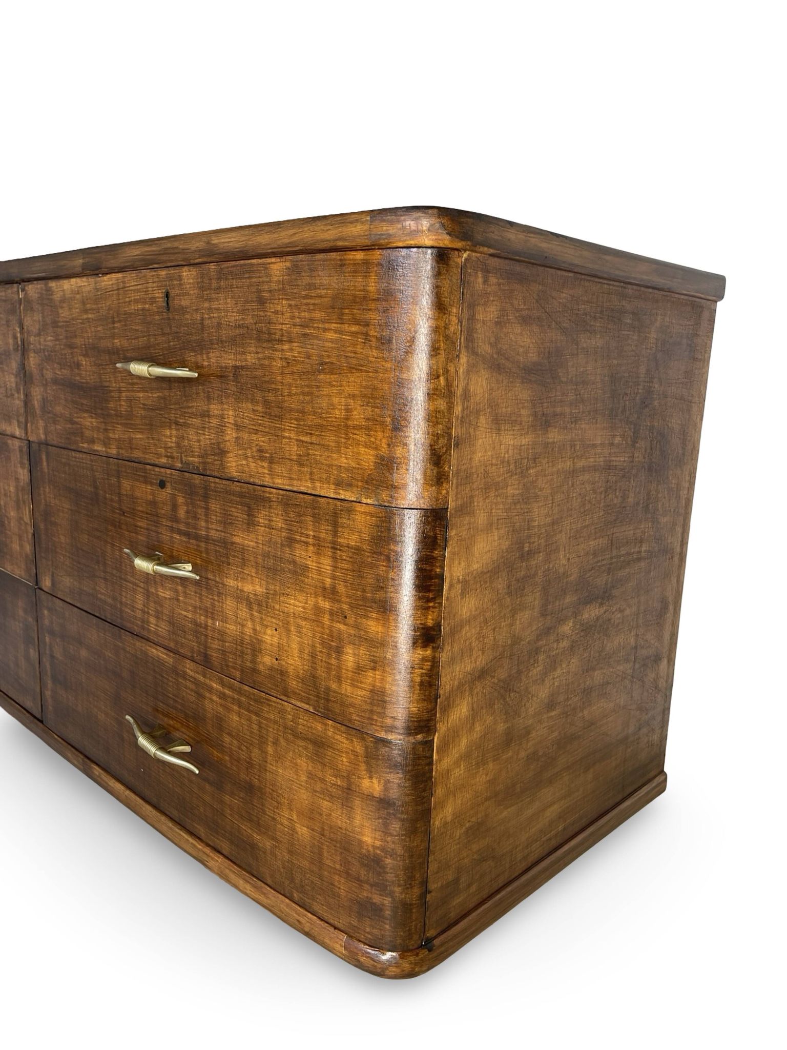 A vintage Italian chest of drawers, made of veneered walnut and solid wood,