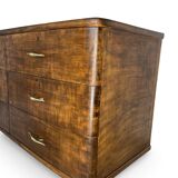 A vintage Italian chest of drawers, made of veneered walnut and solid wood,
