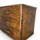 A vintage Italian chest of drawers, made of veneered walnut and solid wood,