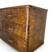 A vintage Italian chest of drawers, made of veneered walnut and solid wood,