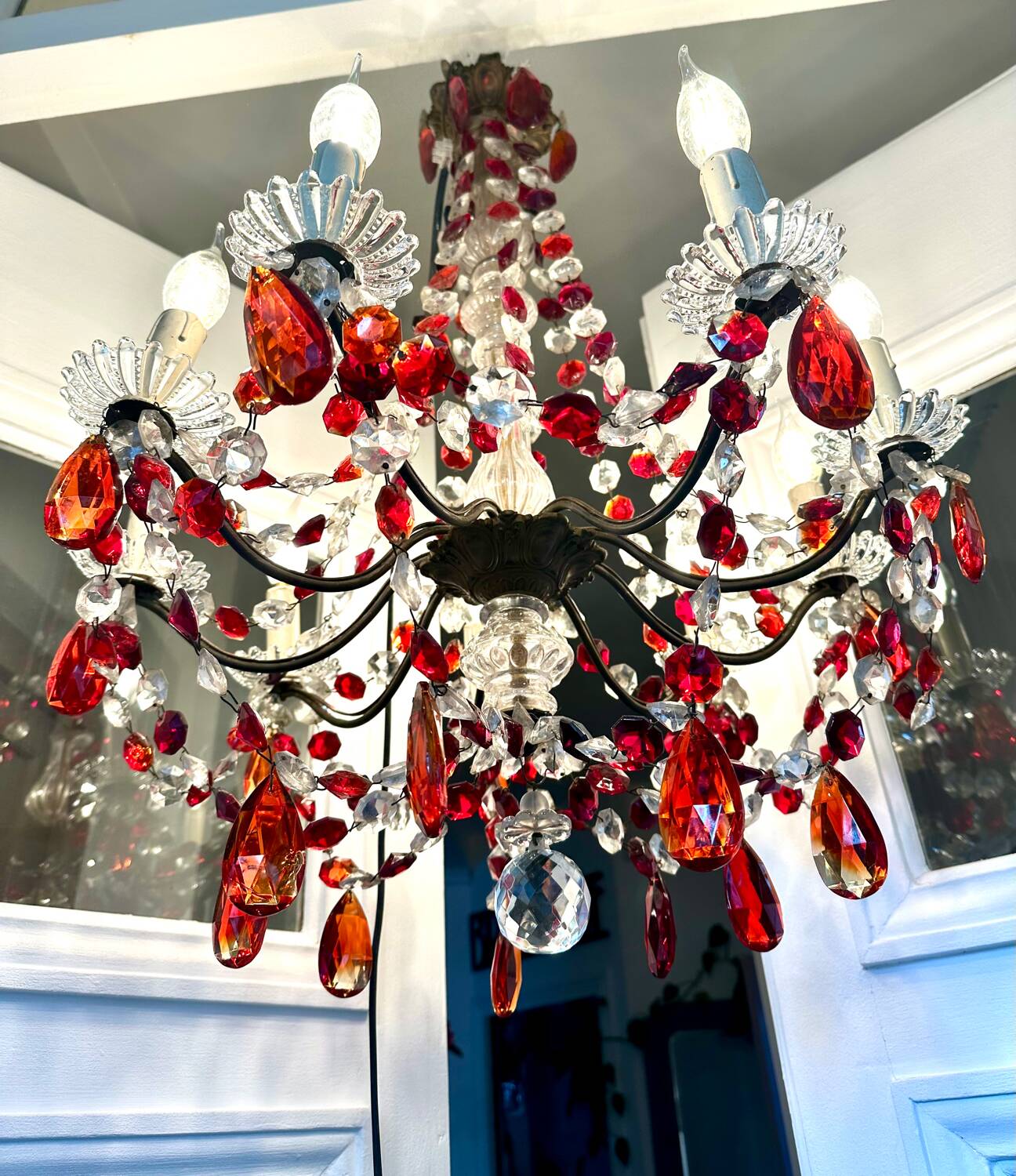 Antique chandelier with red crystal pendants, 9 lights.
