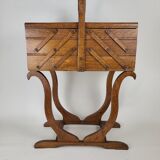 Worker on vintage wooden legs