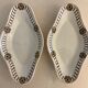 Pair of art deco raviers signed Longwy and numbered, model Gerazine