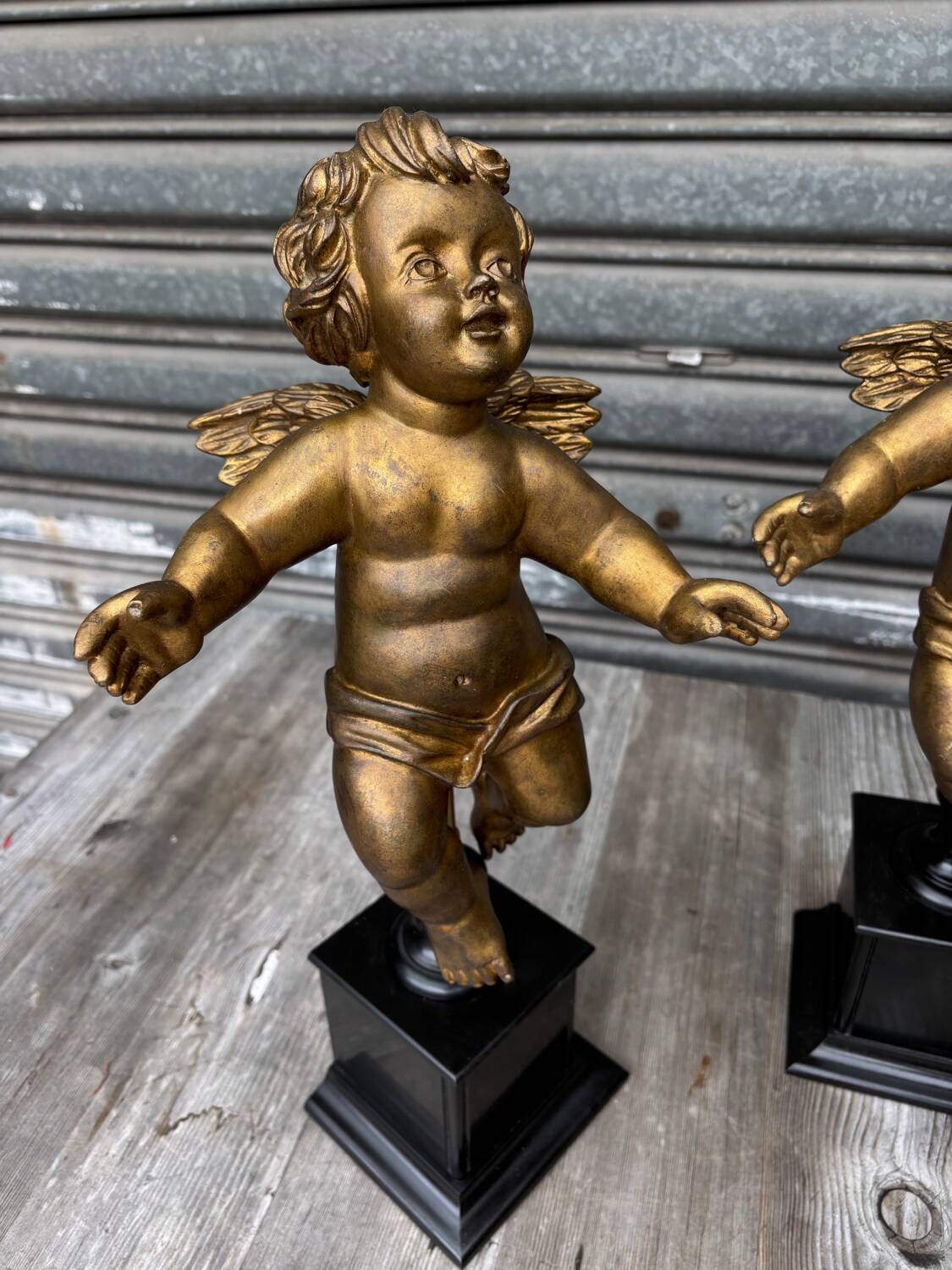 Pair of gilded cherubs on a Napoléon III base