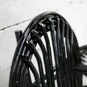Pair of black lacquered rattan armchairs. France, cira 1960.