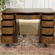 English desk from the 1950s in mahogany with a leather top.