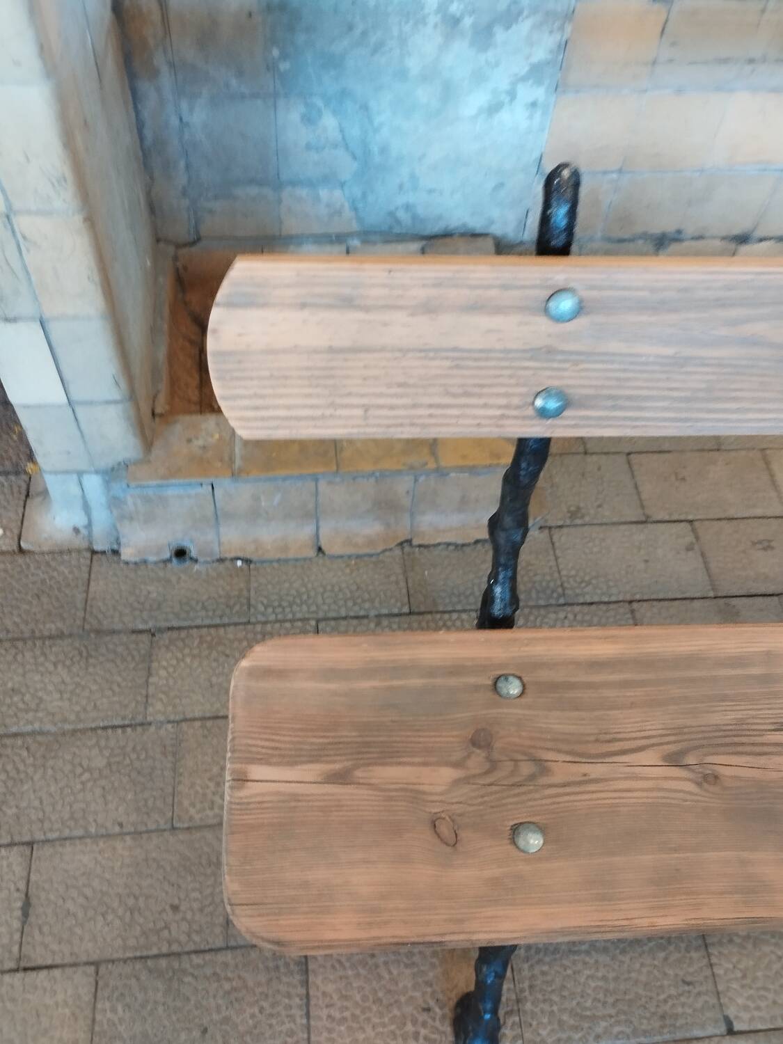 Antique garden bench with cast iron legs