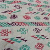 White carpet with multicolored Berber patterns handmade